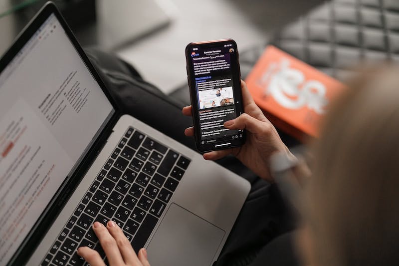 Person holding a black iphone